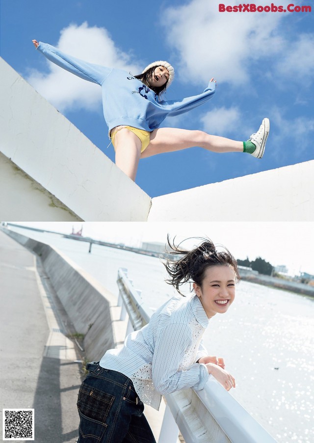 A woman in a blue shirt and yellow shorts jumping in the air.